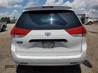 2014 Toyota Sienna L with VIN 5TDZK3DCXES463632, listed as a Copart auction lot 69957284 with 206,250 mi miles and Salvage Title. Bid and sale history available at carsss.com. Image 6.