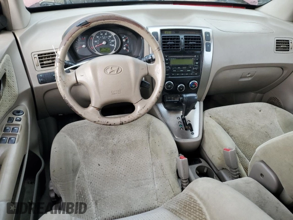 2005 Hyundai Tucson GLS with VIN KM8JN12D05U129525, listed as a Copart auction lot 79690934 with 169,061 mi miles and Salvage Title. Bid and sale history available at carsss.com. Image 8.