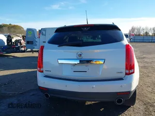 2012 Cadillac SRX Luxury Collection z VIN 3GYFNAE37CS576292, wystawiony jako IAAI lot #41048054 z przebiegiem 158 948 mil mil oraz . Historia ofert i sprzedaży dostępna na DreamBid. Obrazek 16.