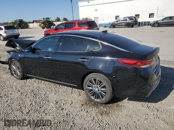 2018 Kia Optima SX with VIN 5XXGV4L26JG206377, listed as a Copart auction lot 58848385 with Not provided miles and Salvage title. Bid and sale history available at DreamBid. Image 2.