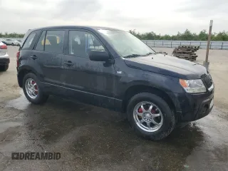 2007 Suzuki Grand Vitara with VIN JS3TE941474202110, listed as a Copart auction lot 52110865 with 132,661 mi miles and Salvage title. Bid and sale history available at DreamBid. Image 4.