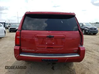 2015 Chevrolet Suburban LTZ with VIN 1GNSKKKC6FR556105, listed as a Copart auction lot 64034304 with 106,269 mi miles and Salvage Title. Bid and sale history available at DreamBid. Image 6.