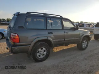 2000 Toyota Land Cruiser z VIN JT3HT05J9Y0123937, wystawiony jako Copart lot #56599145 z przebiegiem 132 262 mil mil oraz Szkoda całkowita • Salvage title. Historia ofert i sprzedaży dostępna na DreamBid. Obrazek 3.