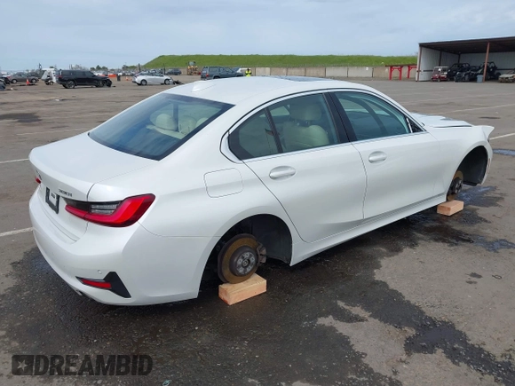 2021 BMW 3 Series 330i z VIN 3MW5R1J08M8C07261, wystawiony jako IAAI lot #41861814 z przebiegiem 87 426 mil mil oraz . Historia ofert i sprzedaży dostępna na DreamBid. Obrazek 4.