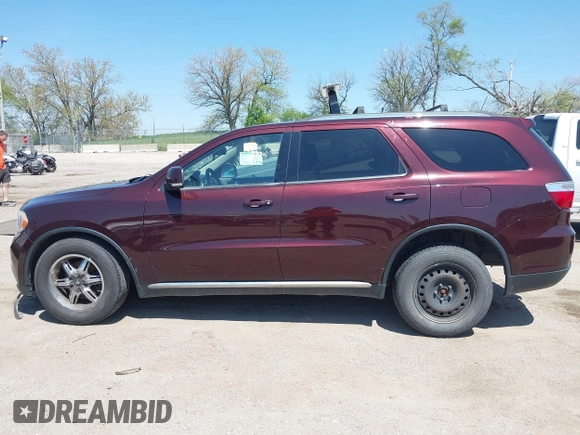 2012 Dodge Durango Crew with VIN 1C4RDJDG0CC337408, listed as a IAAI auction lot 42193647 with 186,352 mi miles and . Bid and sale history available at carsss.com. Image 15.