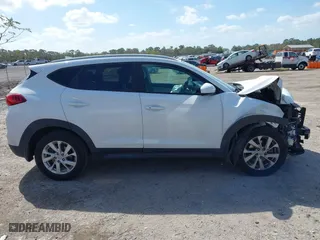 2019 Hyundai Tucson Value with VIN KM8J33A43KU065995, listed as a IAAI auction lot 41720471 with 95,732 mi miles. Bid and sale history available at carsss.com. Image 13.