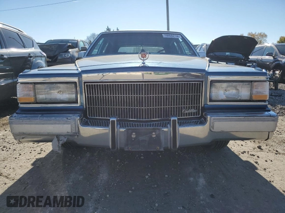 1992 Cadillac Brougham z VIN 1G6DW54E7NR707492, wystawiony jako Copart lot #79950214 z przebiegiem 263 624 mil mil oraz Tytuł czysty. Historia ofert i sprzedaży dostępna na DreamBid. Obrazek 5.