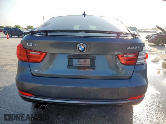 2015 BMW 3 Series 328i Gran Turismo xDrive z VIN WBA3X5C56FD560634, wystawiony jako Copart lot #52714445 z przebiegiem 156 903 mil mil oraz Czysty tytuł • Clean title. Historia ofert i sprzedaży dostępna na DreamBid. Obrazek 6.