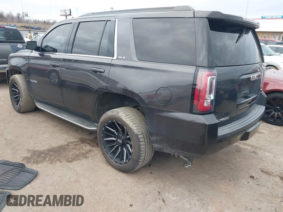 2016 GMC Yukon SLE with VIN 1GKS2AKC9GR249021, listed as a IAAI auction lot 41524997 with 183,272 mi miles. Bid and sale history available at carsss.com. Image 3.