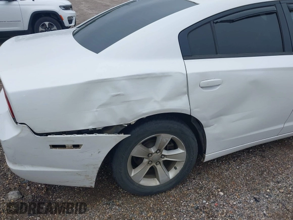 2014 Dodge Charger SE with VIN 2C3CDXBG5EH277920, listed as a IAAI auction lot 42109354 with 146,615 mi miles and . Bid and sale history available at carsss.com. Image 6.