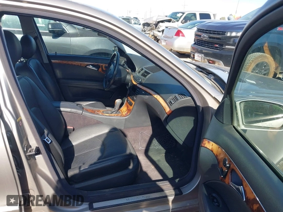 2003 Mercedes-Benz E-Class 3.2L with VIN WDBUF65J63A315547, listed as a IAAI auction lot 41979639 with 106,844 mi miles. Bid and sale history available at carsss.com. Image 5.