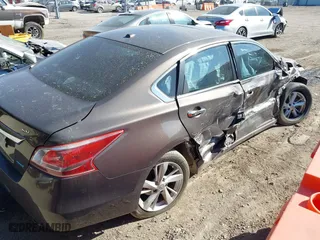 2013 Nissan Altima 2.5 SV with VIN 1N4AL3AP0DN408408, listed as a IAAI auction lot 41827791 with 184,504 mi miles. Bid and sale history available at carsss.com. Image 4.