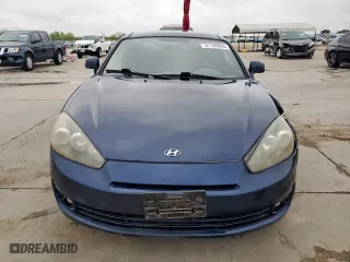 2008 Hyundai Tiburon GS with VIN KMHHM66D98U283776, listed as a Copart auction lot 51109895 with 125,095 mi miles and Salvage Title. Bid and sale history available at carsss.com. Image 5.