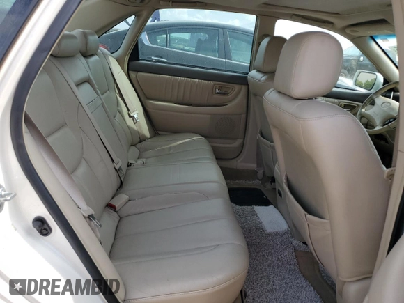 2001 Toyota Avalon XL z VIN 4T1BF28B91U155354, wystawiony jako Copart lot #52393885 z przebiegiem 277 545 mil mil oraz Szkody całkowita. Historia ofert i sprzedaży dostępna na DreamBid. Obrazek 10.