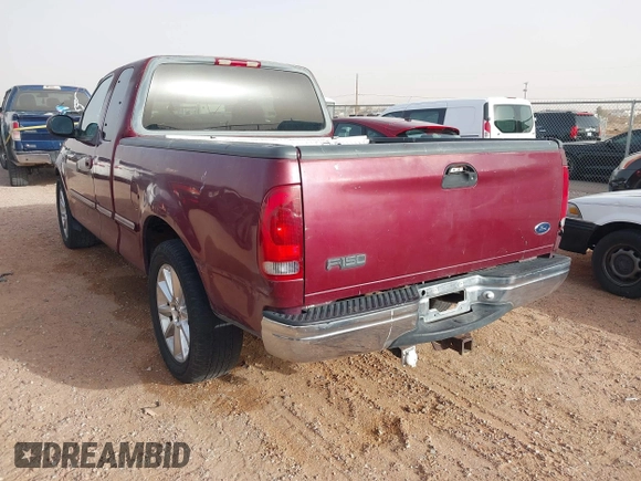 1998 Ford F-150 with VIN 1FTZX17WXWKB63416, listed as a IAAI auction lot 41604048 with 214,890 mi miles and . Bid and sale history available at DreamBid. Image 3.