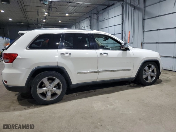 2012 Jeep Grand Cherokee Overland with VIN 1C4RJFCT5CC185100, listed as a Copart auction lot 42745615 with 126,696 mi miles and Salvage Title. Bid and sale history available at carsss.com. Image 3.