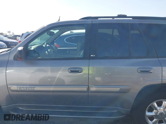 2005 GMC Envoy SLE with VIN 1GKDS13S452306939, listed as a IAAI auction lot 41931667 with 236,955 mi miles and . Bid and sale history available at DreamBid. Image 15.