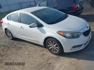 2014 Kia Forte LX with VIN KNAFX4A65E5204073, listed as a IAAI auction lot 42155914 with 167,079 mi miles and . Bid and sale history available at carsss.com. Image 1.