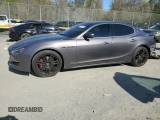 2018 Maserati Ghibli S Q4 GranLusso with VIN ZAM57YTLXJ1295010, listed as a Copart auction lot 52415045 with 67,904 mi miles and Salvage title. Bid and sale history available at DreamBid. Image 1.