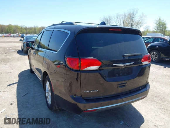 2017 Chrysler Pacifica Touring L with VIN 2C4RC1BG0HR747551, listed as a IAAI auction lot 42139664 with 120,057 mi miles and . Bid and sale history available at DreamBid. Image 3.