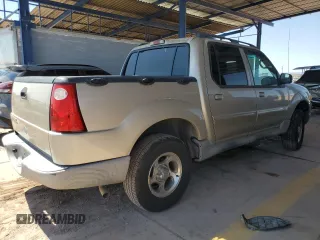 2004 Ford Explorer Sport Trac XLS with VIN 1FMZU67K14UC21140, listed as a Copart auction lot 57873115 with 131,040 mi miles and Clean title. Bid and sale history available at DreamBid. Image 3.