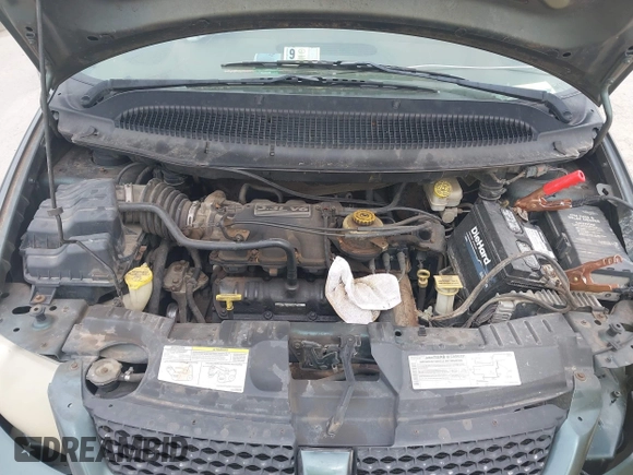 2003 Dodge Grand Caravan with VIN 2D4GP44313R240791, listed as a IAAI auction lot 41937009 with 231,913 mi miles and . Bid and sale history available at DreamBid. Image 10.