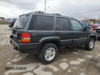 1998 Jeep Grand Cherokee Limited with VIN 1J4GZ78Y7WC163186, listed as a Copart auction lot 75011954 with 247,991 mi miles and Salvage Title. Bid and sale history available at carsss.com. Image 3.