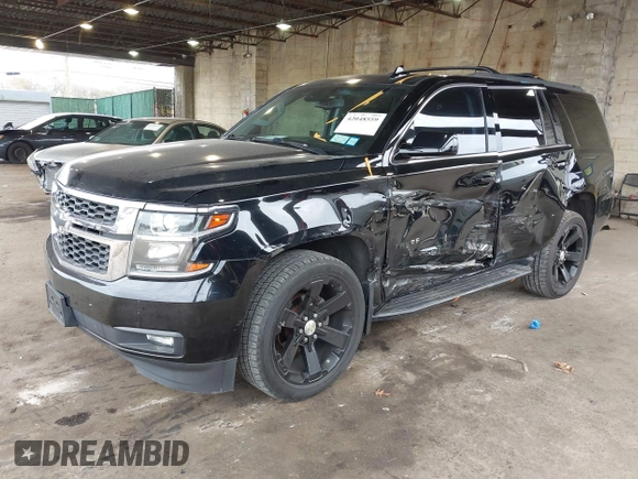 2015 Chevrolet Tahoe LT with VIN 1GNSKBKCXFR604401, listed as a IAAI auction lot 42048559 with 60,768 mi miles and . Bid and sale history available at DreamBid. Image 17.
