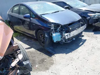 2015 Toyota Prius Four with VIN JTDKN3DUXF1937207, listed as a IAAI auction lot 41239892 with 162,140 mi miles and . Bid and sale history available at DreamBid. Image 1.