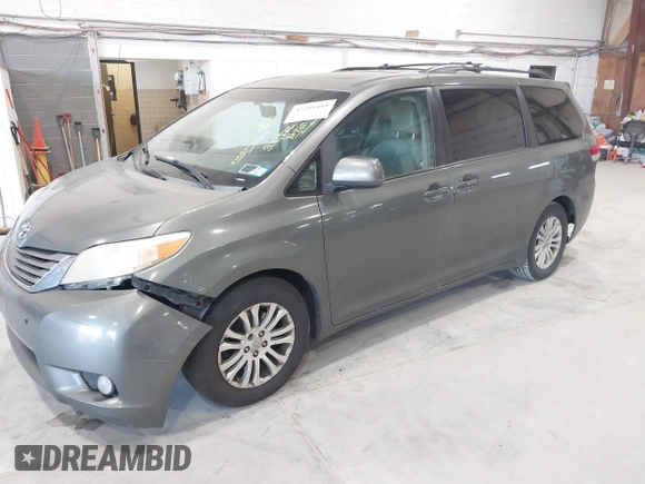 2011 Toyota Sienna XLE AAS with VIN 5TDYK3DC8BS111639, listed as a IAAI auction lot 42108488 with 300,872 mi miles and . Bid and sale history available at DreamBid. Image 2.