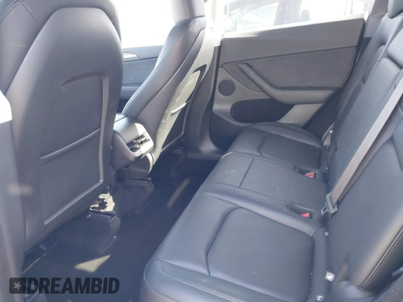 2025 Tesla Model Y Long Range with VIN 7SAYGDED2SF228414, listed as a IAAI auction lot 41706470 with 11,319 mi miles and . Bid and sale history available at DreamBid. Image 8.