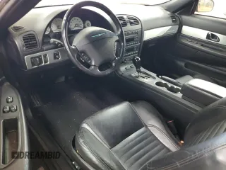 2003 Ford Thunderbird Deluxe z VIN 1FAHP60A13Y111694, wystawiony jako Copart lot #55953435 z przebiegiem 37 522 mil mil oraz Szkody całkowita. Historia ofert i sprzedaży dostępna na DreamBid. Obrazek 8.