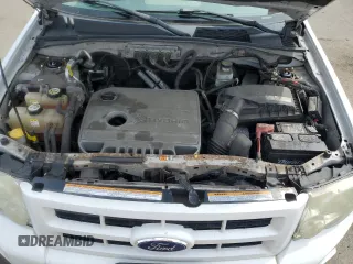 2010 Ford Escape Hybrid z VIN 1FMCU5K30AKC13098, wystawiony jako Copart lot #53623855 z przebiegiem 206 975 mil mil oraz Szkoda całkowita • Salvage title. Historia ofert i sprzedaży dostępna na DreamBid. Obrazek 12.