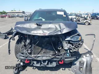 2017 Jeep Grand Cherokee Trailhawk with VIN 1C4RJFLG7HC654259, listed as a IAAI auction lot 42510197 with 103,947 mi miles and . Bid and sale history available at DreamBid. Image 6.