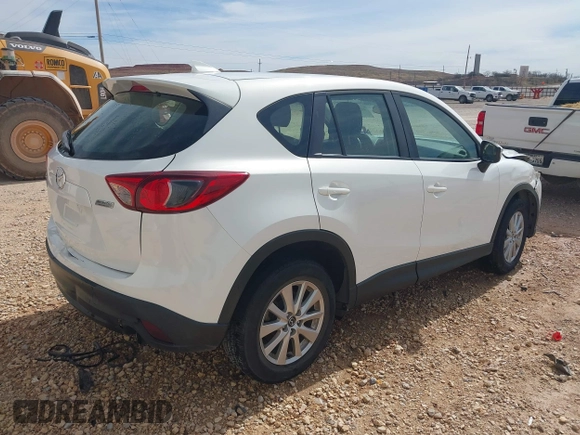 2016 Mazda CX-5 Sport with VIN JM3KE2BYXG0683318, listed as a IAAI auction lot 41777751 with 116,922 mi miles. Bid and sale history available at carsss.com. Image 4.