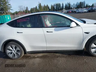 2024 Tesla Model Y Long Range with VIN 7SAYGDEE1RF056816, listed as a IAAI auction lot 41809125 with 6,434 mi miles and . Bid and sale history available at DreamBid. Image 14.