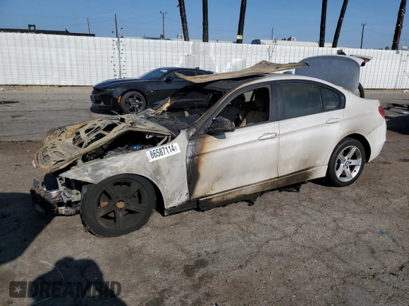 2013 BMW 3 Series 320i with VIN WBA3B1C50DK128766, listed as a Copart auction lot 86587114 with 0 mi miles and Salvage Title. Bid and sale history available at carsss.com. Image 1.