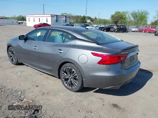 2017 Nissan Maxima SR with VIN 1N4AA6AP1HC387058, listed as a IAAI auction lot 42112287 with 128,460 mi miles and . Bid and sale history available at DreamBid. Image 3.