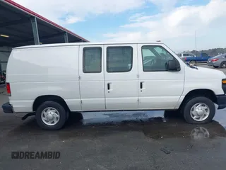 2013 Ford Econoline Cargo Commercial with VIN 1FTNE2EL2DDA97948, listed as a IAAI auction lot 41616701 with 199,739 mi miles and . Bid and sale history available at DreamBid. Image 13.
