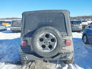 2004 Jeep Wrangler Sahara with VIN 1J4FA59S94P731123, listed as a IAAI auction lot 41288284 with 138,515 mi miles and . Bid and sale history available at DreamBid. Image 16.