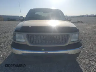 1999 Ford F-150 with VIN 1FTRX17W9XNB77873, listed as a Copart auction lot 52851065 with Not provided miles and Salvage title. Bid and sale history available at DreamBid. Image 5.