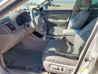 2004 Toyota Camry LE z VIN 4T1BE32K94U313343, wystawiony jako Copart lot #58053425 z przebiegiem 120 515 mil mil oraz Szkoda całkowita • Salvage title. Historia ofert i sprzedaży dostępna na DreamBid. Obrazek 7.