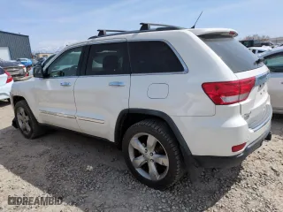2012 Jeep Grand Cherokee Overland with VIN 1C4RJFCG9CC199486, listed as a Copart auction lot 51942135 with 113,098 mi miles and Salvage Title. Bid and sale history available at carsss.com. Image 2.
