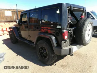 2015 Jeep Wrangler Unlimited Sahara with VIN 1C4BJWEG0FL568237, listed as a IAAI auction lot 41697726 with 82,751 mi miles. Bid and sale history available at carsss.com. Image 3.