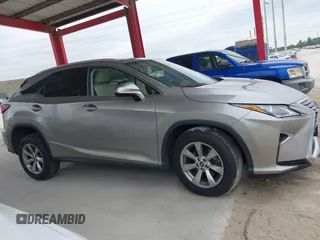 2018 Lexus RX 350 z VIN 2T2BZMCA3JC151296, wystawiony jako IAAI lot #41331203 z przebiegiem 73 051 mil mil oraz . Historia ofert i sprzedaży dostępna na DreamBid. Obrazek 13.