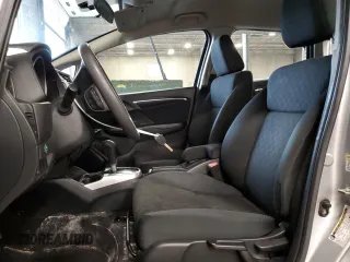 2015 Honda Fit LX with VIN 3HGGK5H55FM711979, listed as a Copart auction lot 62756625 with 79,345 mi miles and Salvage title. Bid and sale history available at DreamBid. Image 7.