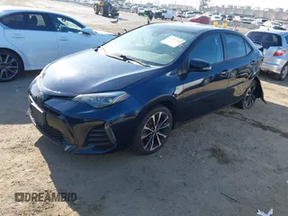 2019 Toyota Corolla L with VIN 5YFBURHE7KP922064, listed as a IAAI auction lot 41977741 with 54,896 mi miles and . Bid and sale history available at DreamBid. Image 2.
