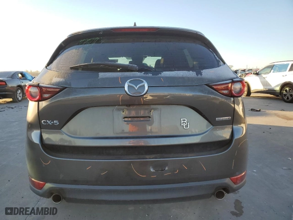2020 Mazda CX-5 Touring with VIN JM3KFACM8L1779956, listed as a Copart auction lot 42601955 with NaN miles and Salvage Title. Bid and sale history available at carsss.com. Image 6.