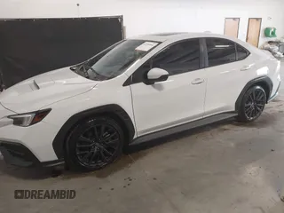 2023 Subaru WRX Premium с VIN JF1VBAF68P9823577, выставлен на аукционе IAAI как лот 42300844 с пробегом 13 055 миль миль и . История ставок и продаж доступна на DreamBid. Изображение 2.