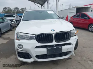 2017 BMW X4 M40i with VIN 5UXXW7C59H0M91384, listed as a IAAI auction lot 41883585 with 163,547 mi miles. Bid and sale history available at carsss.com. Image 13.